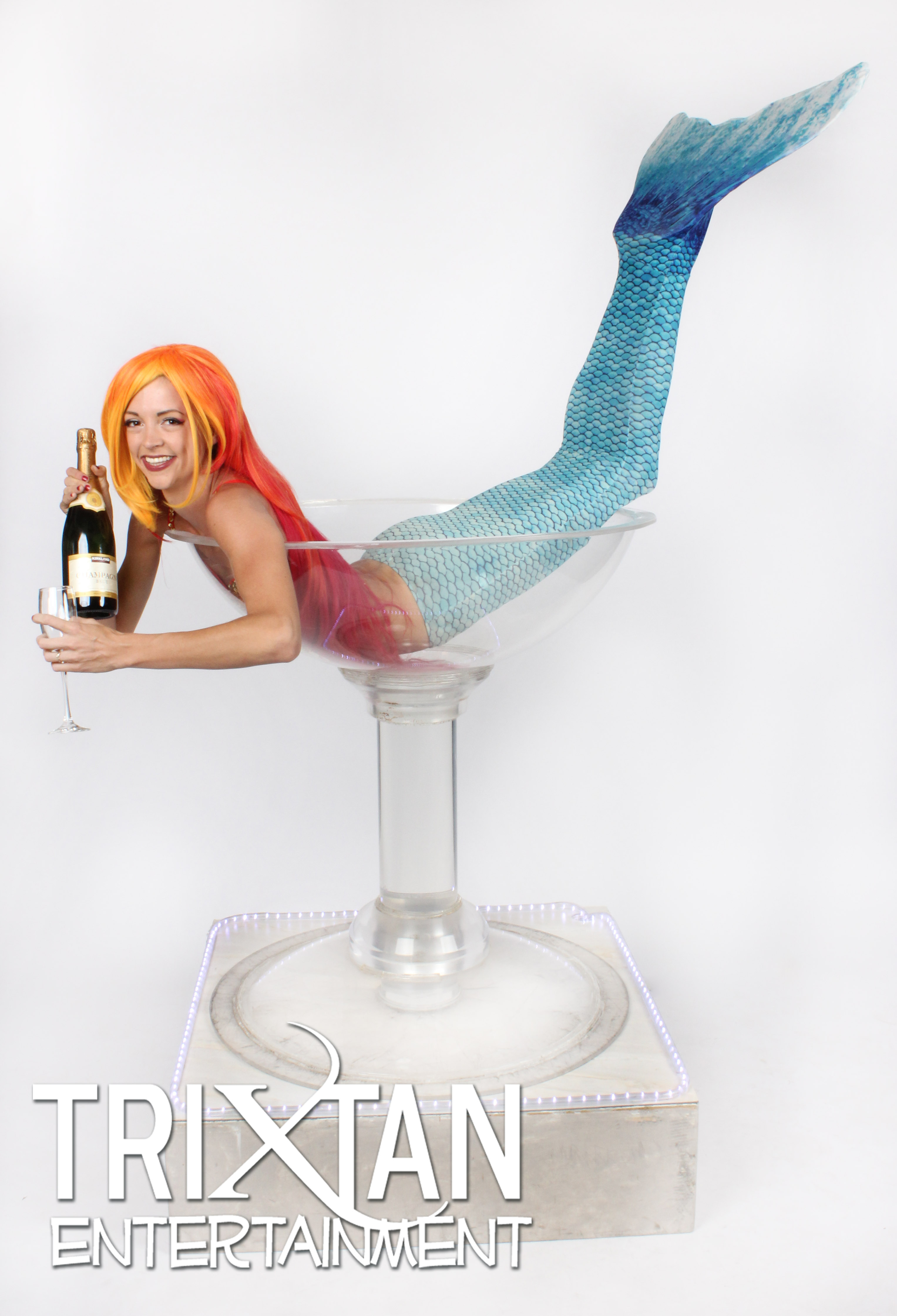 martini, mermaid, blue tail, champagne, red hair, orange hair. giant martini glass